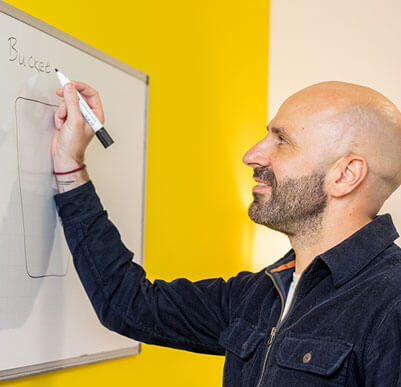 close up of clinician writing on a white board