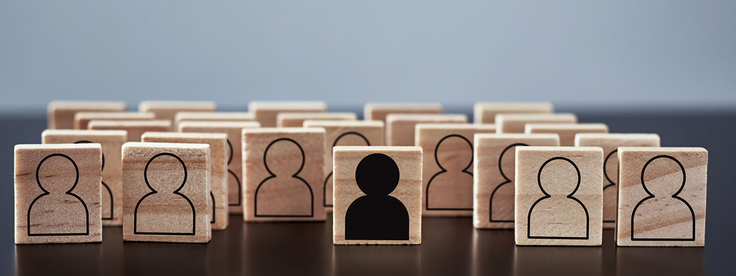 feet wearing converse walking along old grey steps