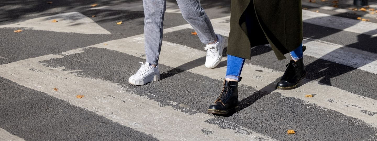 Think positive spelt out in blocks on table with group of pencils