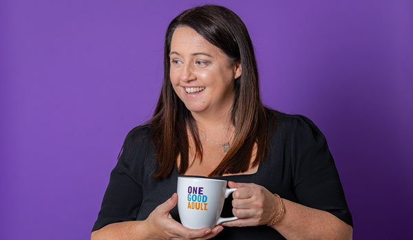 Vanessa Dowling holding one good adult mug