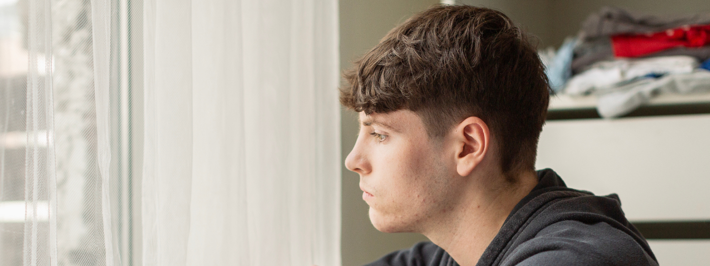 YP looking out window