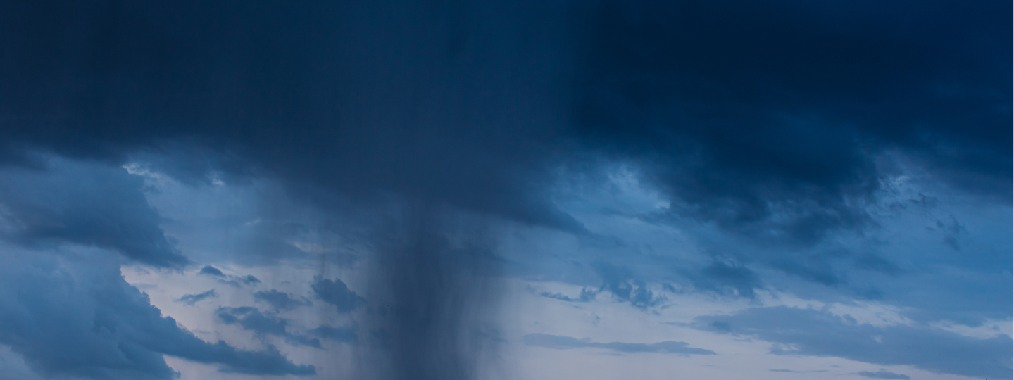 young man looking out of window