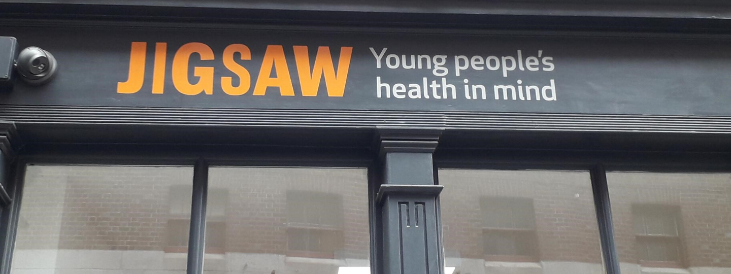 Young person looking at their phone