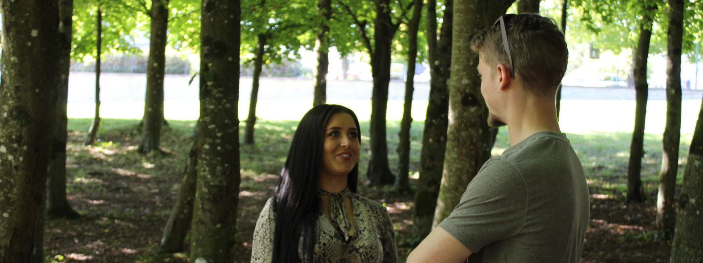 Close up of a pencil being pushed on paper and breaking